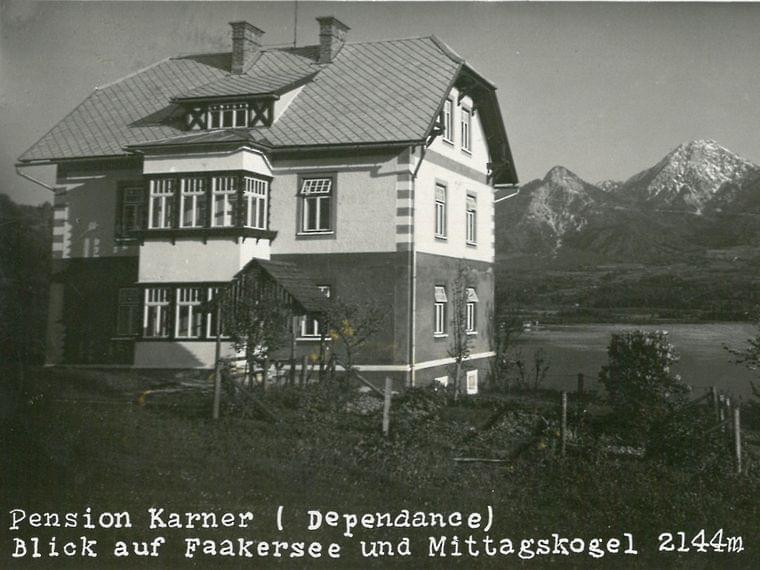Historic guesthouse Pension Karner with view of Lake Faak and Mittagskogel mountain
