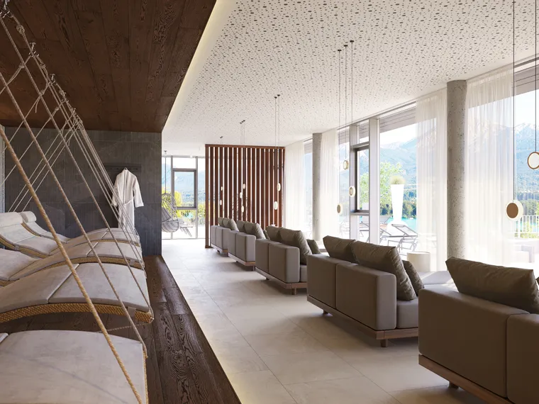 Moderner Spa-Ruheraum mit Hängeliegen und Bergblick durch große Fenster