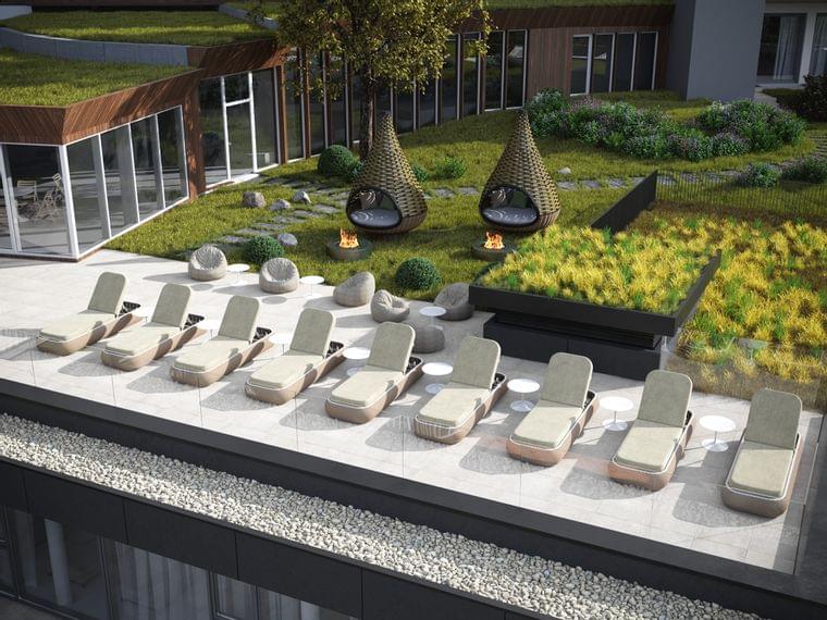 Moderne Spa-Dachterrasse mit Sonnenliegen, Feuerschalen und grüner Bepflanzung